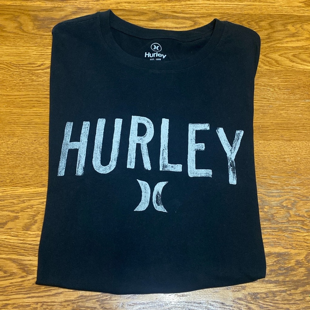Hurley black short sleeve tee shirt with tan letters size large
